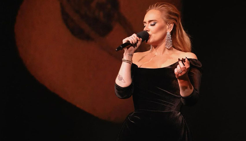 Adele speaks out against audiences throwing objects on stage